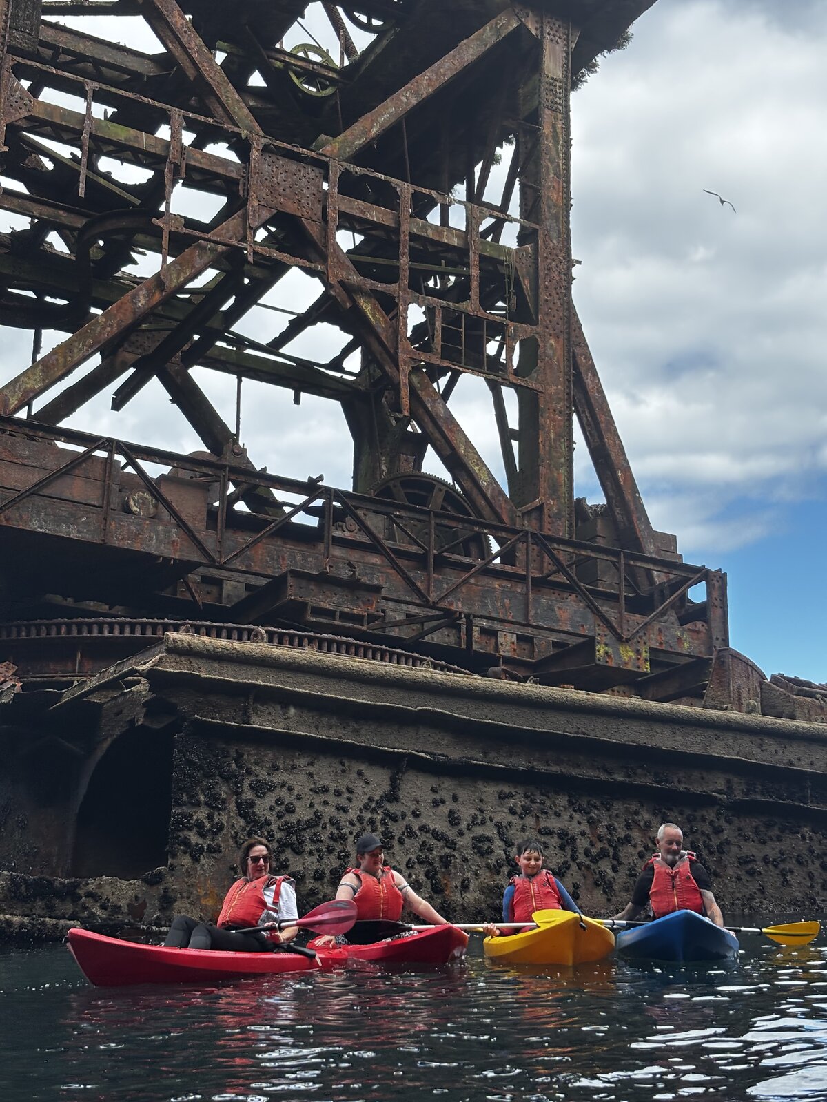Kayakers up close beneath the Samson wreck